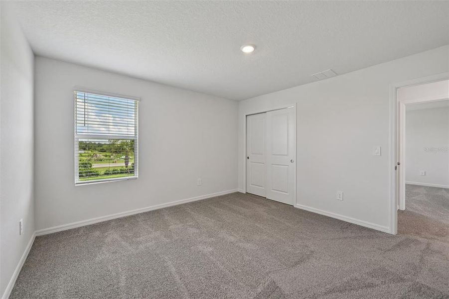 Spacious, unfurnished interior of a new home in Salt Meadows - Premier Series, Parrish (Image 13).