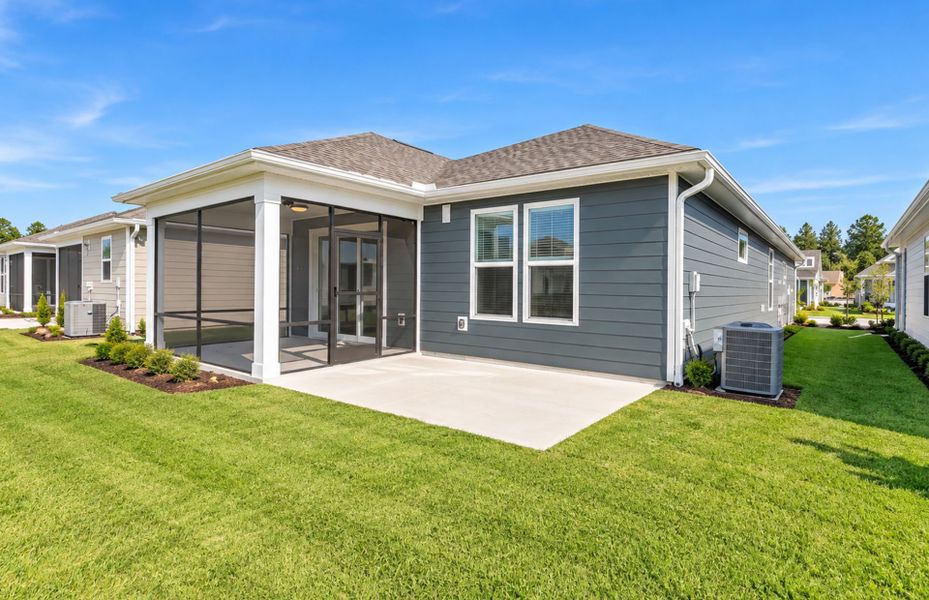 Exterior details and patio area of a home in Del Webb Wilmington at Mallory Creek, Leland (Image 24).
