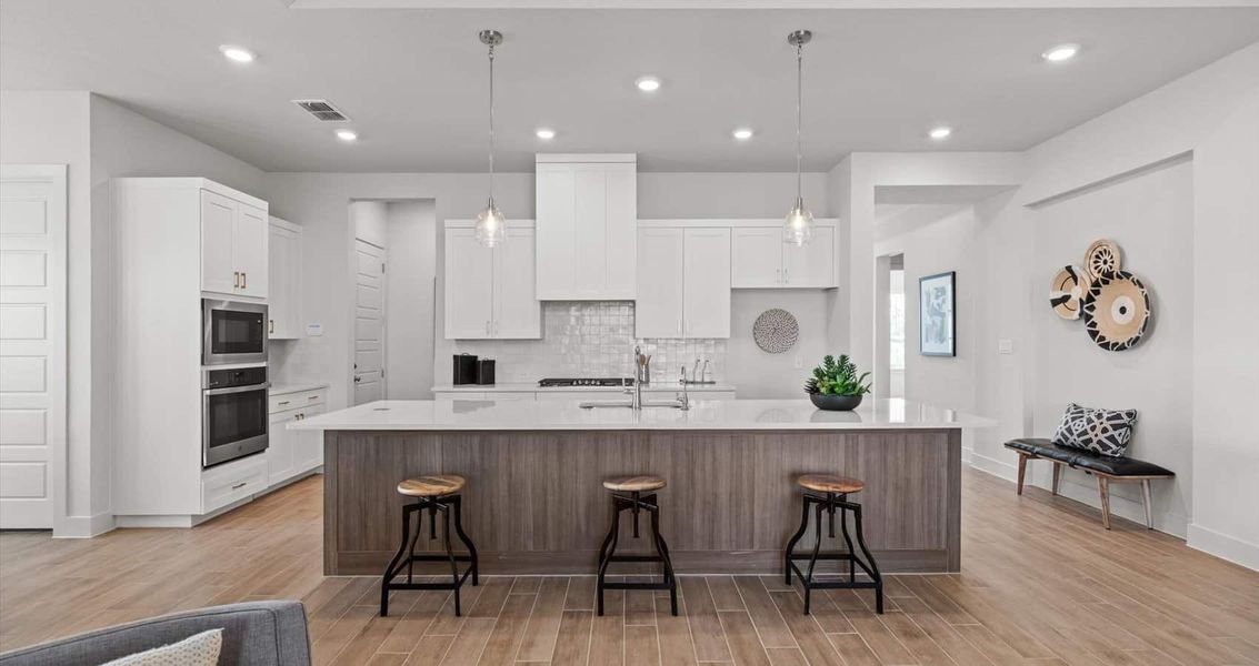 Representative furnished interior of a home built from the Wyatt by Chesmar Homes in Sunfield, Buda (Image 5).