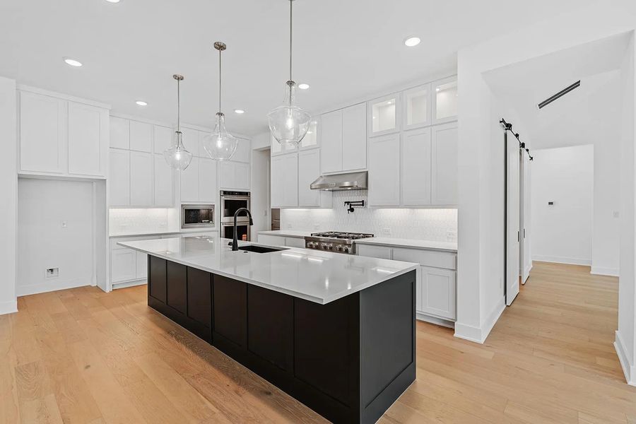 Furnished interior view inside a new home in Caliterra - 110', Dripping Springs (Image 9). Furnished interior view inside a new home in Caliterra - 110', Dripping Springs (Image 9).