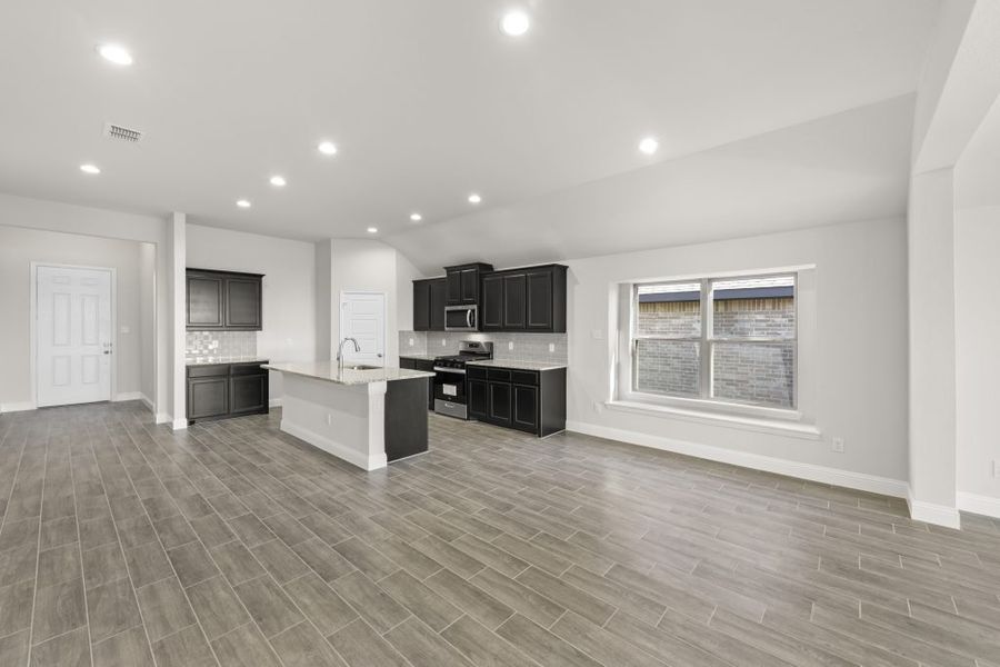 Representative exterior photo of a completed home built from the Kingston by Impression Homes in Arcadia Trails, Balch Springs, TX (Image 13).