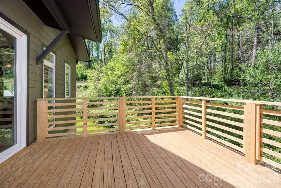 Sunny Deck Overlooks Protected Forest