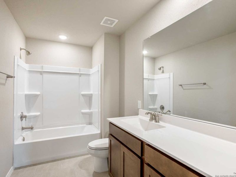 Furnished interior view inside a new home in Hannah Heights, Seguin (Image 12).