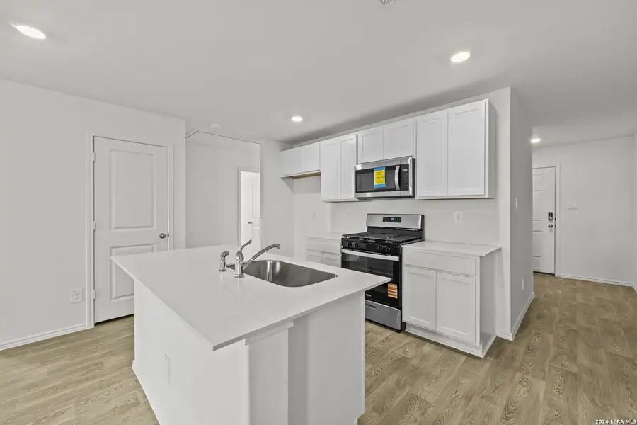 Furnished interior view inside a new home in Hickory Ridge, Elmendorf (Image 9).