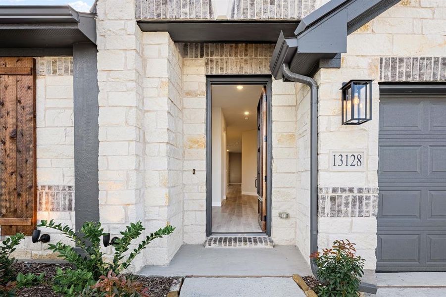 Exterior details and patio area of a home in Woodstone, Providence Village (Image 17). Exterior details and patio area of a home in Woodstone, Providence Village (Image 17).