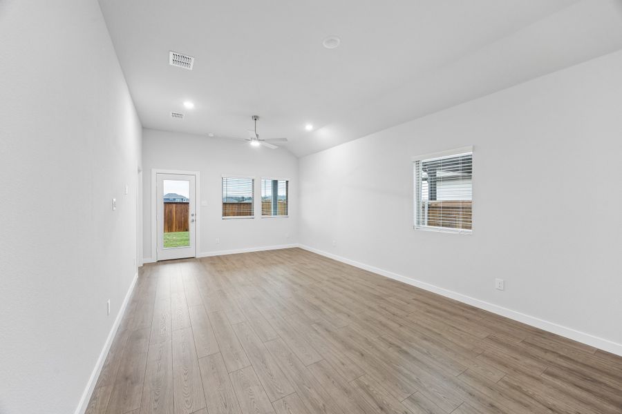 Living Room in the Cedar home plan by Trophy Signature Homes – REPRESENTATIVE PHOTO
