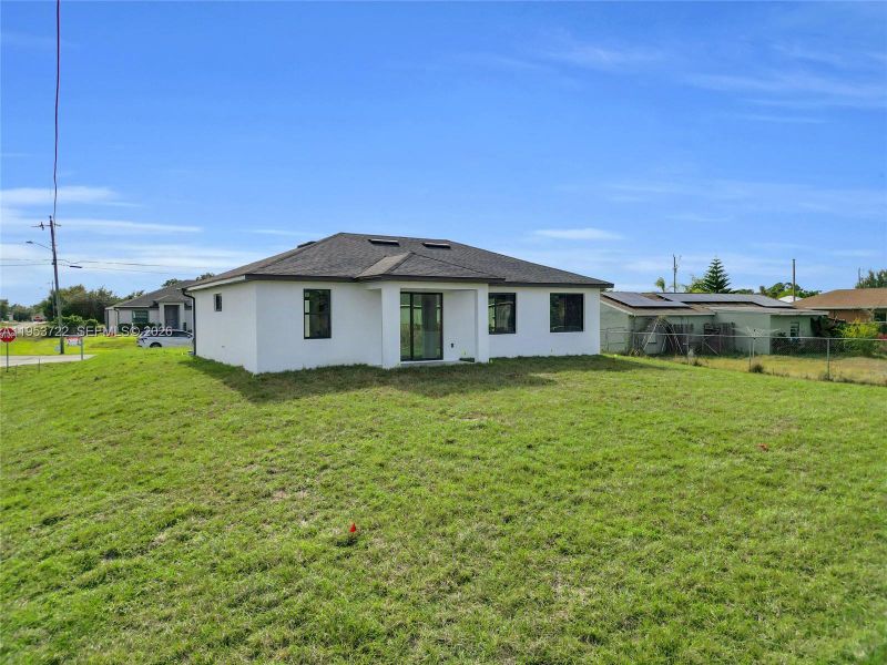 Exterior details and patio area of a home in , Lehigh Acres (Image 3). Exterior details and patio area of a home in , Lehigh Acres (Image 3).