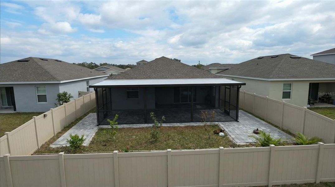 Exterior details and patio area of a home in Village at Windsor Reserve, Eagle Lake (Image 23).