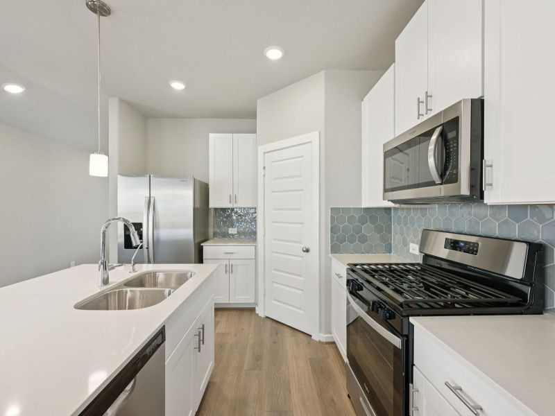 Furnished interior view inside a new home in Pine Lake Cove - Traditional Series, Montgomery (Image 5).