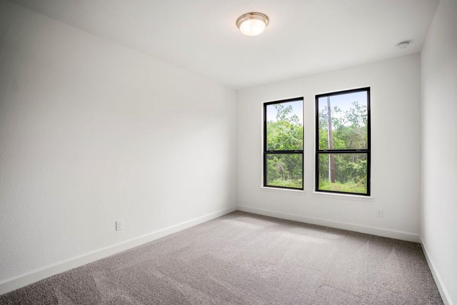Spacious, unfurnished interior of a new home in Fulbrook on Fulshear Creek, Fulshear (Image 29).
