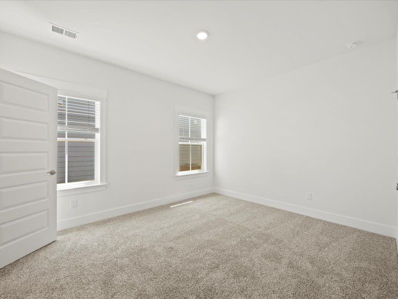 Spacious, unfurnished interior of a new home in The Coves at Lakes of Cane Bay II, Summerville (Image 18). Spacious, unfurnished interior of a new home in The Coves at Lakes of Cane Bay II, Summerville (Image 18).