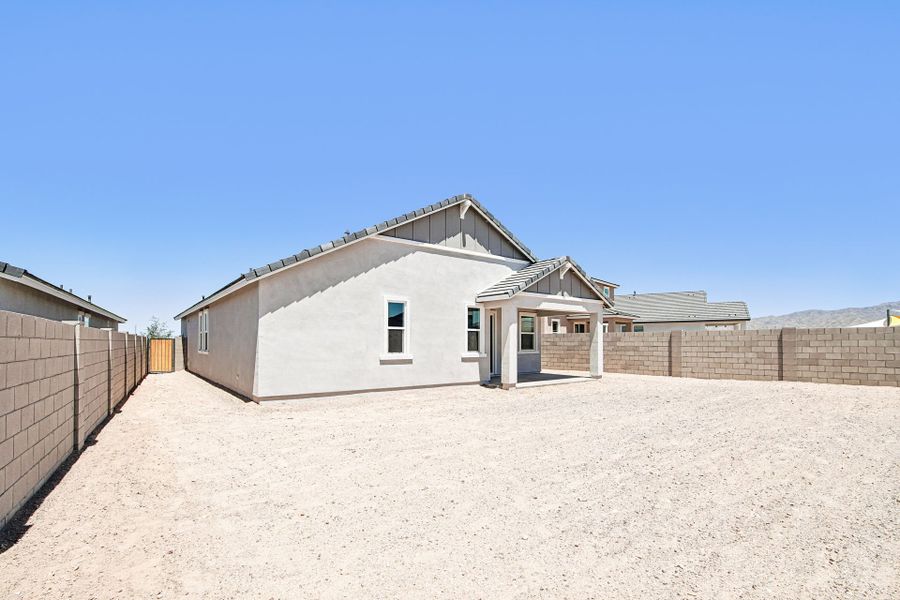 A building in a sandy area.