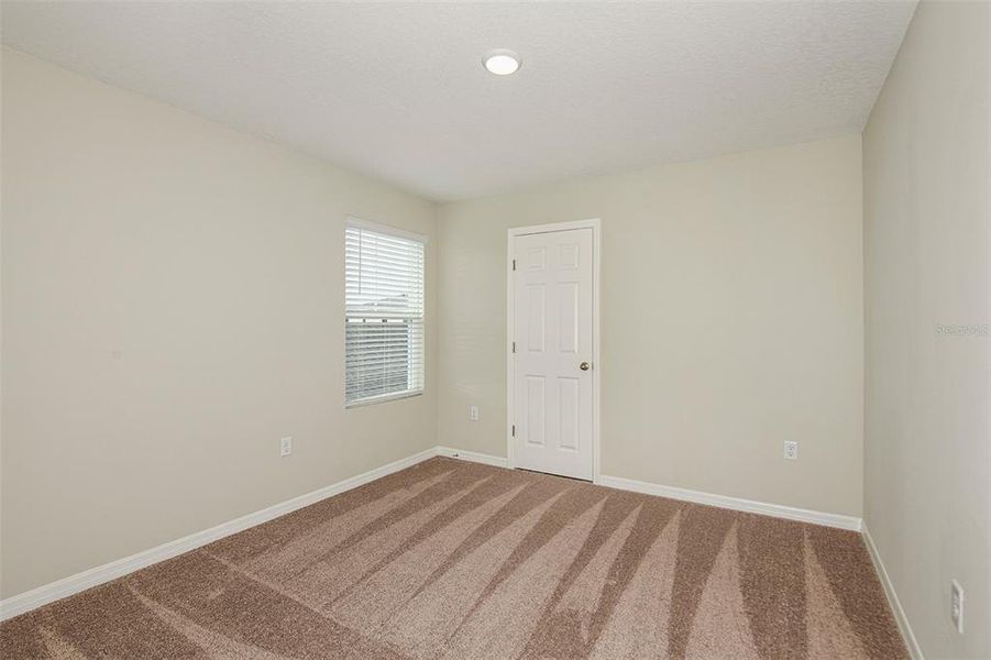 Spacious, unfurnished interior of a new home in Scenic Terrace, Haines City (Image 21).