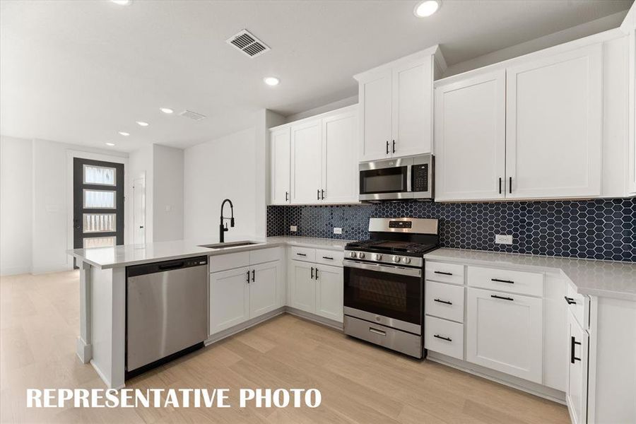 Beautiful finishes and thoughtful design make this kitchen stand out form the crowd!  REPRESENTATIVE PHOTO