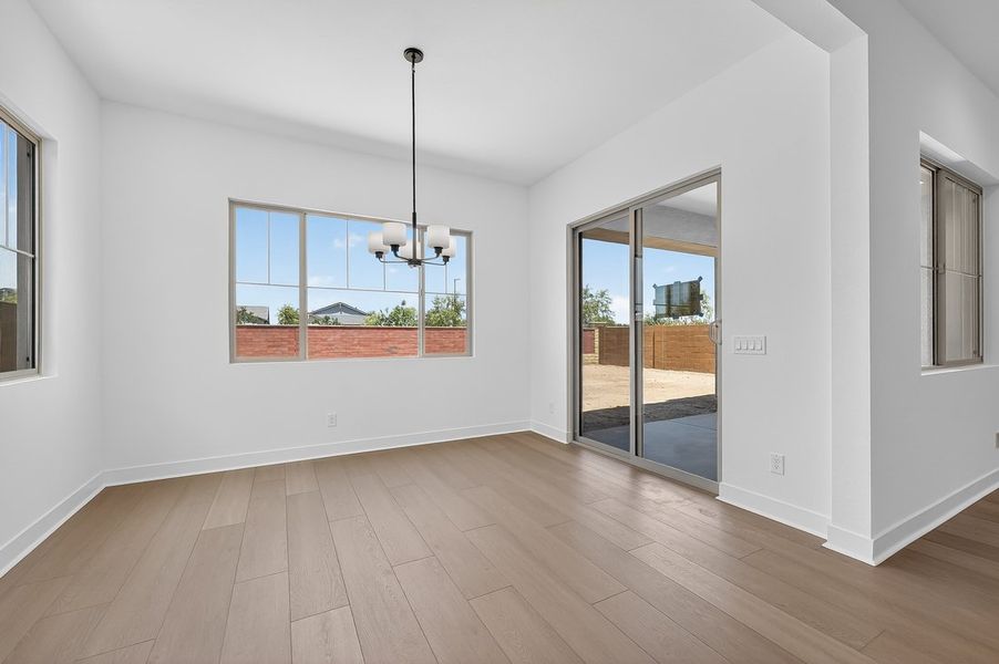 Spacious, unfurnished interior of a new home in Ellsworth Ranch, Queen Creek (Image 18).