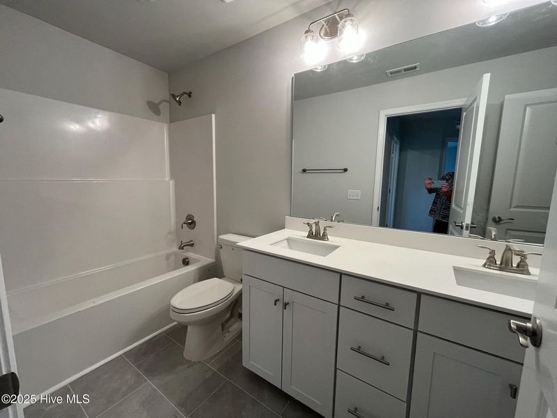 Furnished interior view inside a new home in Palmetto Creek, Bolivia (Image 12).