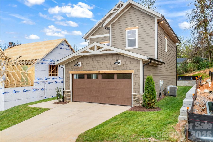 Front exterior of a new home in , Weaverville, NC, highlighting curb appeal (Image 18).