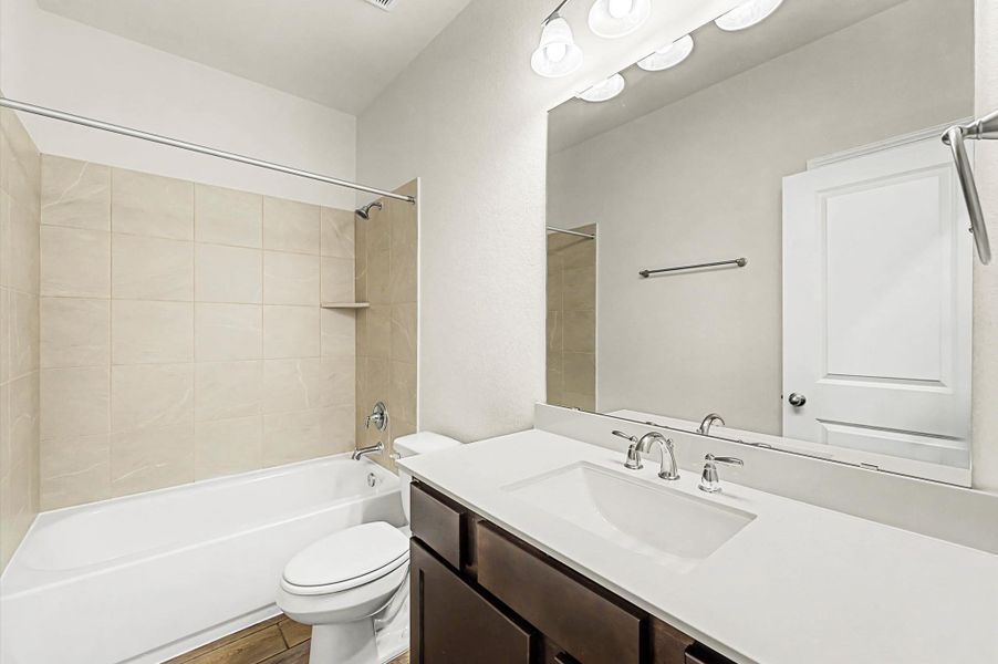 Furnished interior view inside a new home in Peacock Isle, Dickinson (Image 8).