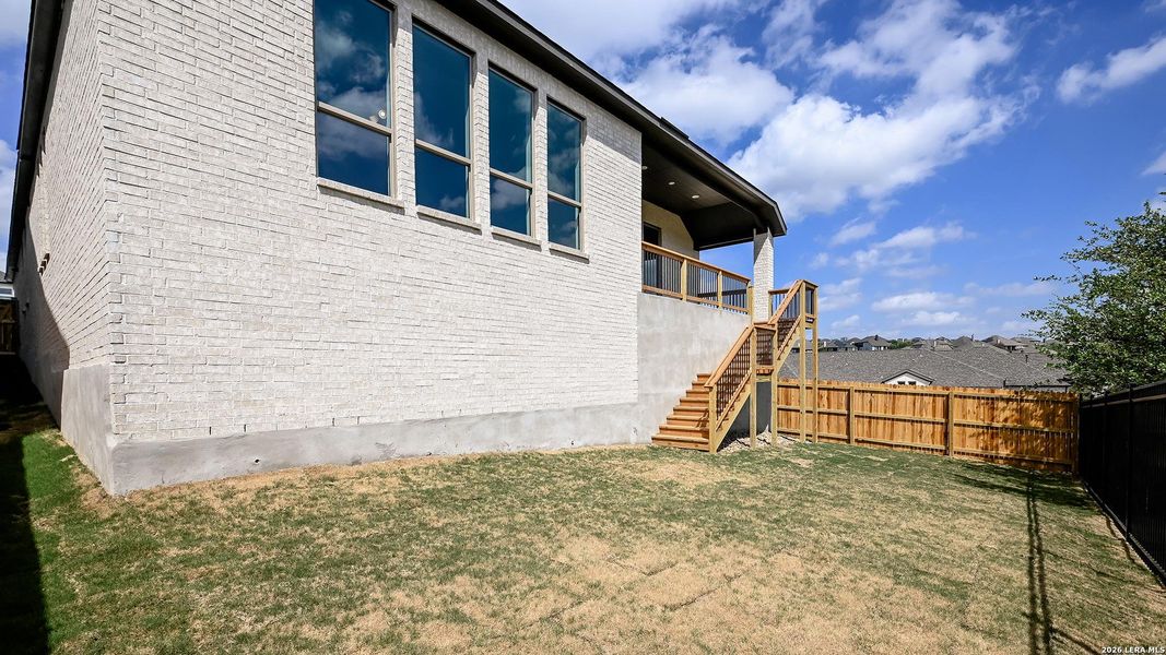 Exterior details and patio area of a home in Johnson Ranch, Bulverde (Image 19).