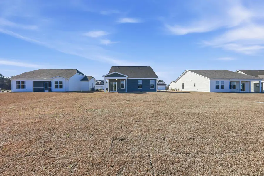 Exterior details and patio area of a home in Edgefield, Loris (Image 3). Exterior details and patio area of a home in Edgefield, Loris (Image 3).