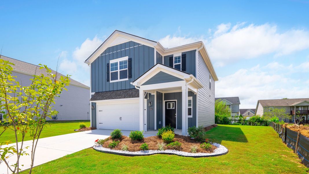 Front exterior of a new home in Harbor Crest, Ooltewah, TN, highlighting curb appeal (Image 19).