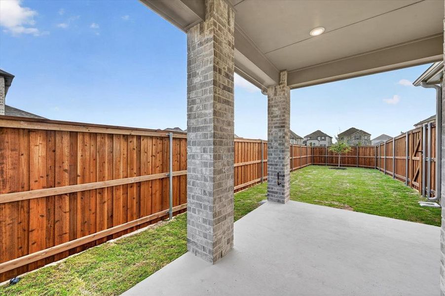 Exterior details and patio area of a home in Wellington, Haslet (Image 2).