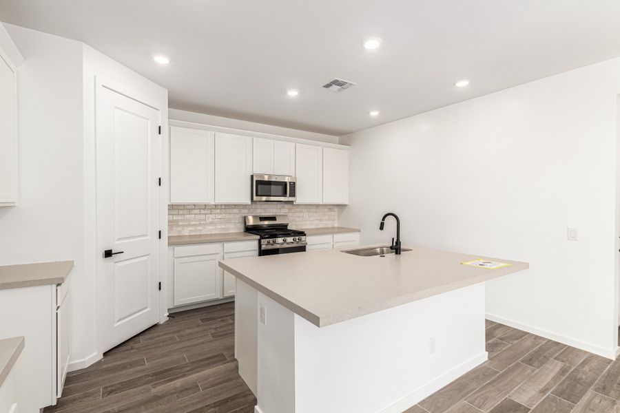 Furnished interior view inside a new home in Bella Vista Farms, San Tan Valley (Image 4).