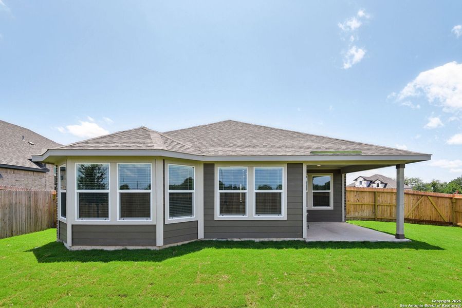 Front exterior of a new home in Carmel Ranch, Schertz, TX, highlighting curb appeal (Image 23). Front exterior of a new home in Carmel Ranch, Schertz, TX, highlighting curb appeal (Image 23).