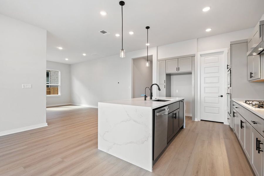 Furnished interior view inside a new home in Arbor Collection at Lariat, Liberty Hill (Image 11). Furnished interior view inside a new home in Arbor Collection at Lariat, Liberty Hill (Image 11).