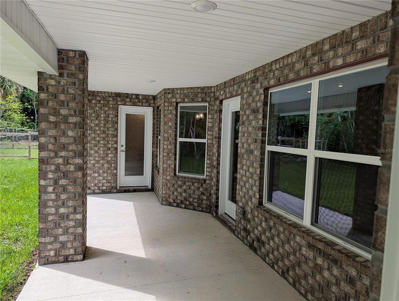 Exterior details and patio area of a home in Palm Coast, Palm Coast (Image 3). Exterior details and patio area of a home in Palm Coast, Palm Coast (Image 3).