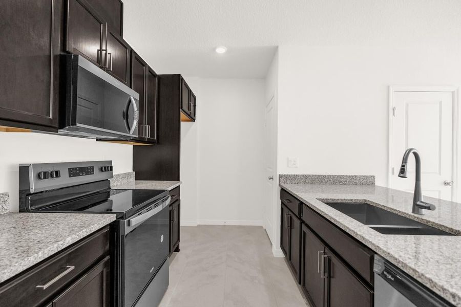 Furnished interior view inside a new home in Reserve at Forest Lake Townhomes, Lake Wales (Image 5).