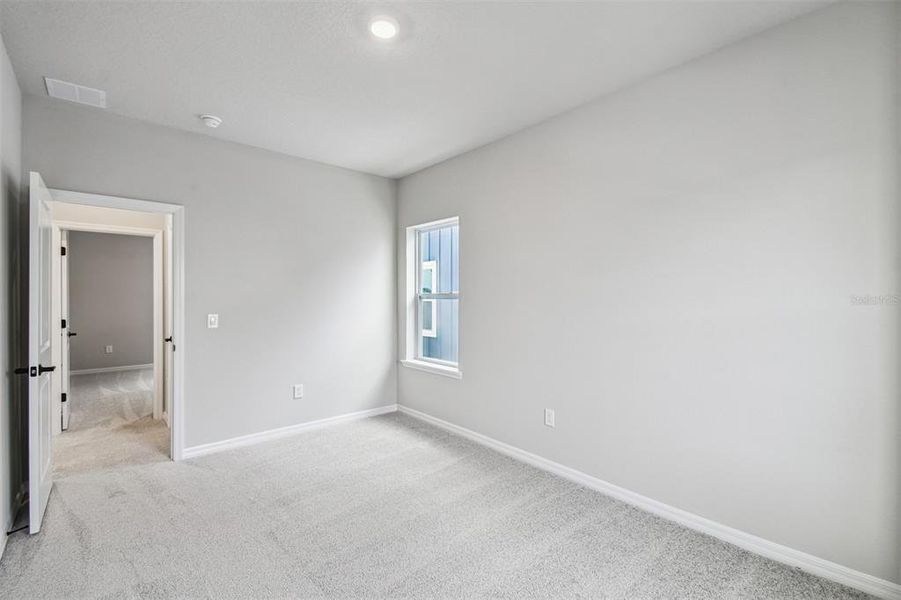Spacious, unfurnished interior of a new home in Weslyn Park in Sunbridge 34', St. Cloud (Image 40).