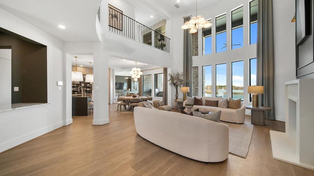 Soaring ceilings bring plenty of light into the formal living space. Representative image. Soaring ceilings bring plenty of light into the formal living space. Representative image.