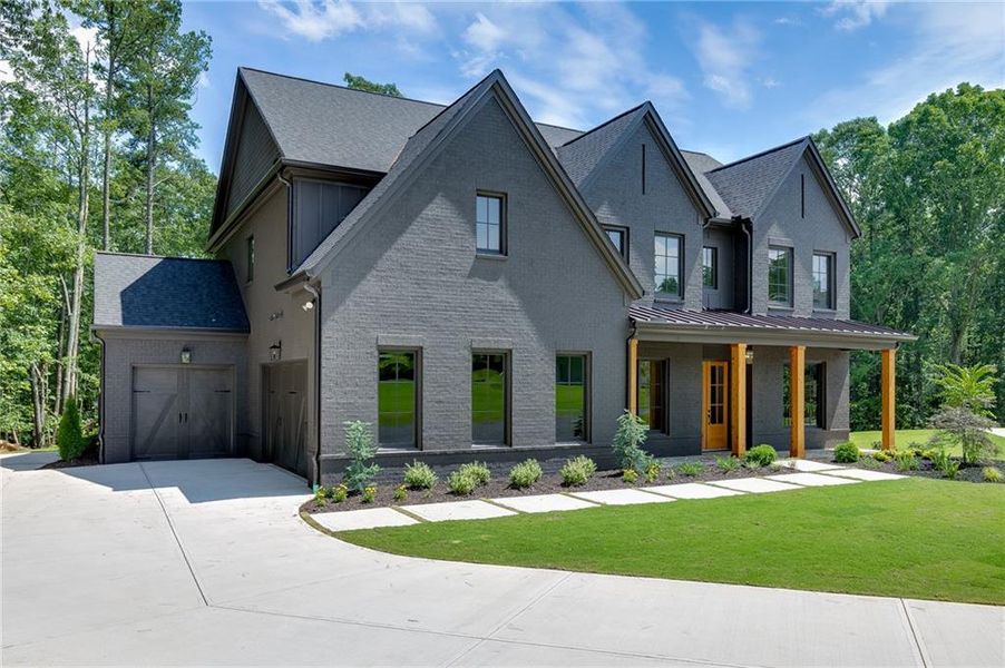 Front exterior of a new home in , Buford, GA, highlighting curb appeal (Image 34).