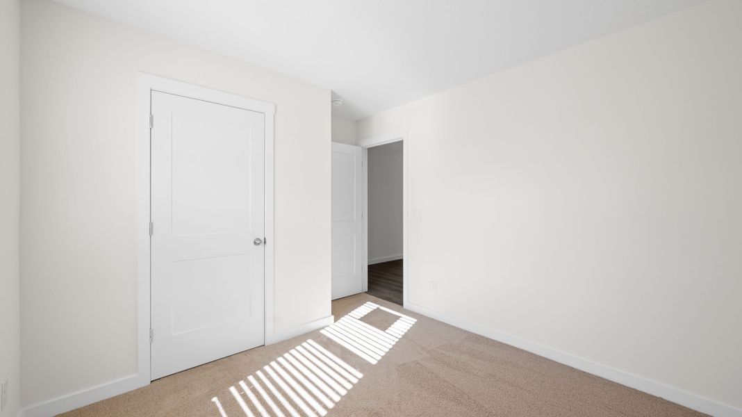 Representative unfurnished interior of a home built from the Sullivan by D.R. Horton in Evergreen Landing, Rossville (Image 11).