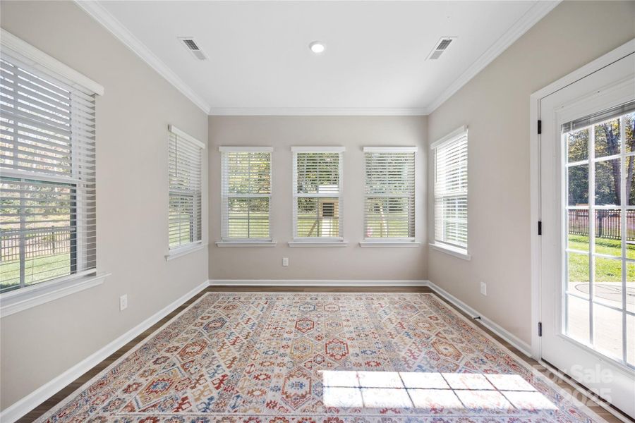 Beautiful sunroom overlooks the backyard. Beautiful sunroom overlooks the backyard.