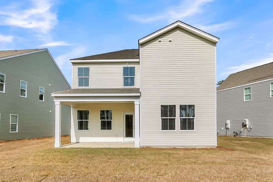 Exterior details and patio area of a home in Wildcat Chase, Summerville (Image 18).