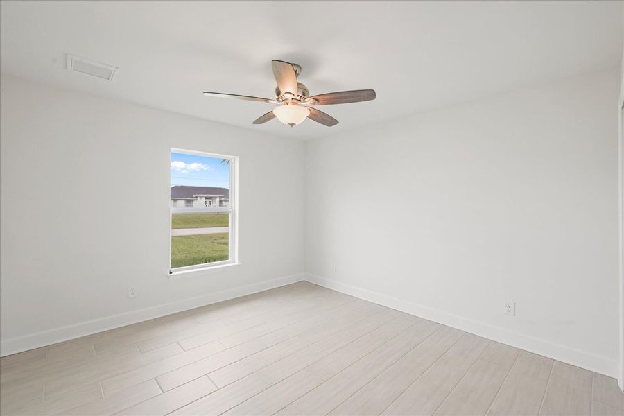 Representative unfurnished interior of a home built from the The Sunset Harbor by Sunlife Homes LLC in Cape Coral, Cape Coral (Image 30). Representative unfurnished interior of a home built from the The Sunset Harbor by Sunlife Homes LLC in Cape Coral, Cape Coral (Image 30).