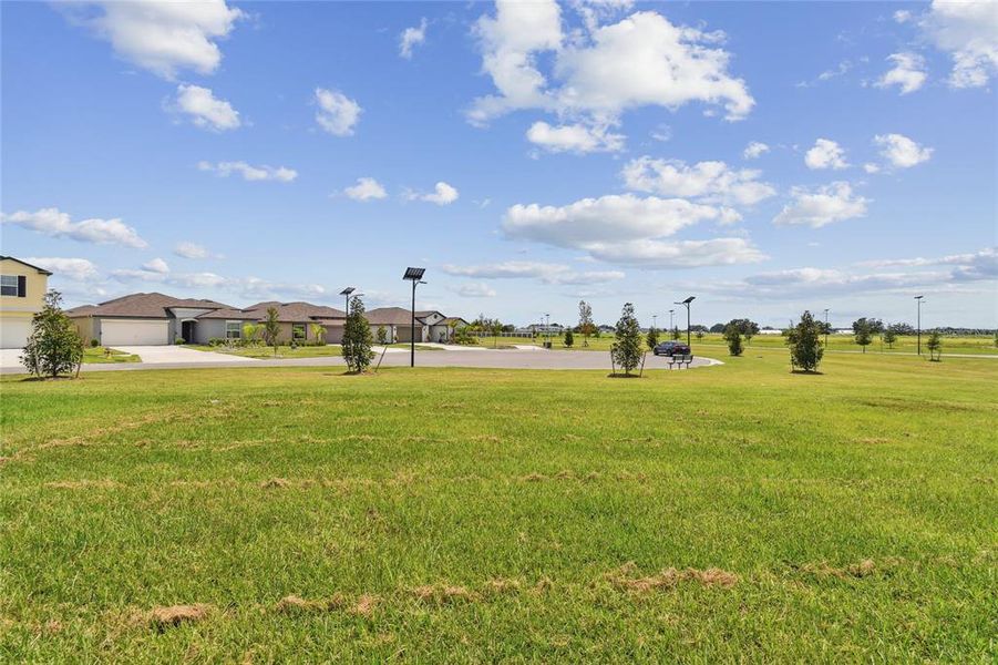 Front exterior of a new home in , San Antonio, FL, highlighting curb appeal (Image 23).