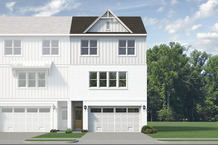 Front exterior of a new home in Anchors Bend Townes, Wilmington, NC, highlighting curb appeal (Image 6). Front exterior of a new home in Anchors Bend Townes, Wilmington, NC, highlighting curb appeal (Image 6).