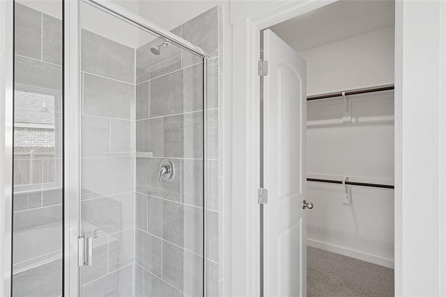 Bathroom featuring walk in shower