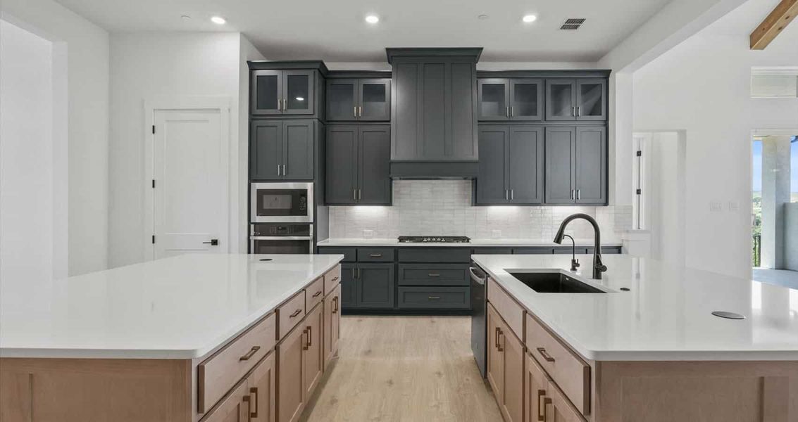 Representative furnished interior of a home built from the Everly by Chesmar Homes in Sweetwater, Austin (Image 4).