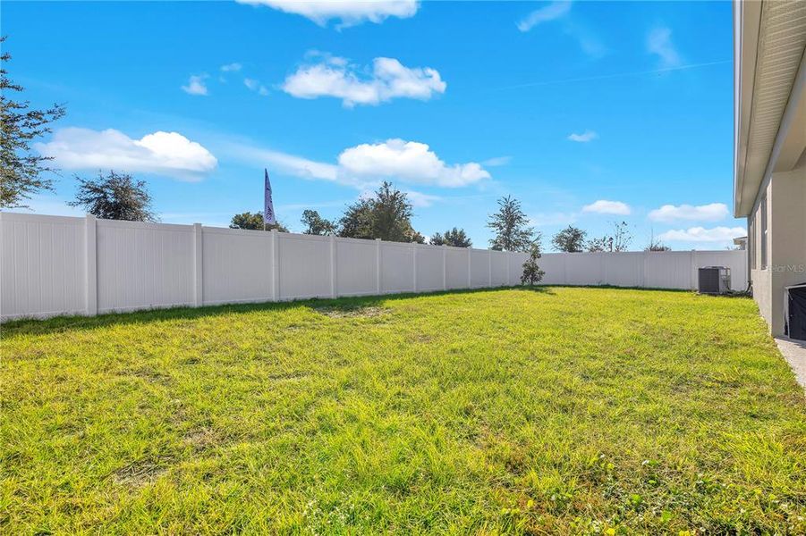 Exterior details and patio area of a home in Meadowlark Landing, Apopka (Image 22).
