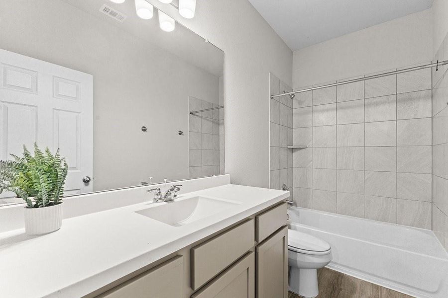 Furnished interior view inside a new home in Mill Creek Trails, Magnolia (Image 13).