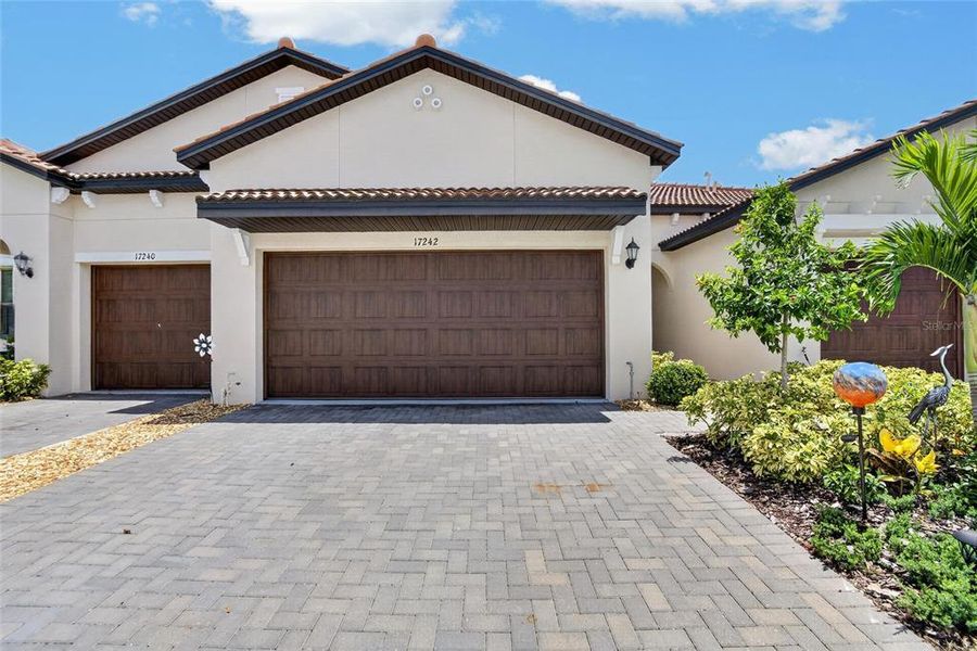 Front exterior of a new home in Southshore Bay Active Adult, Wimauma, FL, highlighting curb appeal (Image 22).
