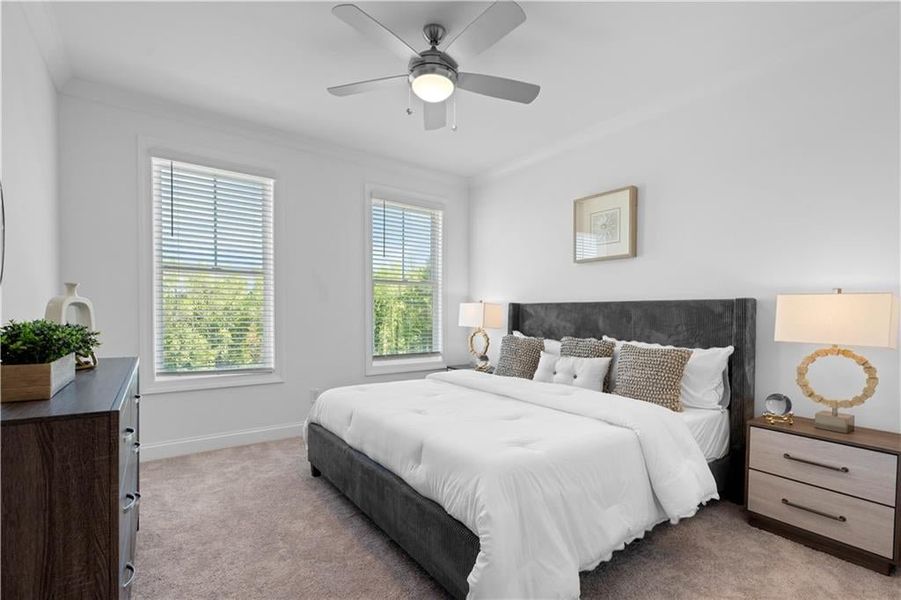 Spacious Owners suite with ceiling Fan & walk in closet *Images shown are from a decorated model of the same floor plan. Design selections and color packages will vary by home.* Spacious Owners suite with ceiling Fan & walk in closet *Images shown are from a decorated model of the same floor plan. Design selections and color packages will vary by home.*