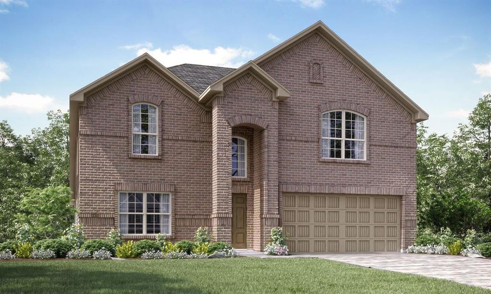 View of front of house with a front yard and a garage