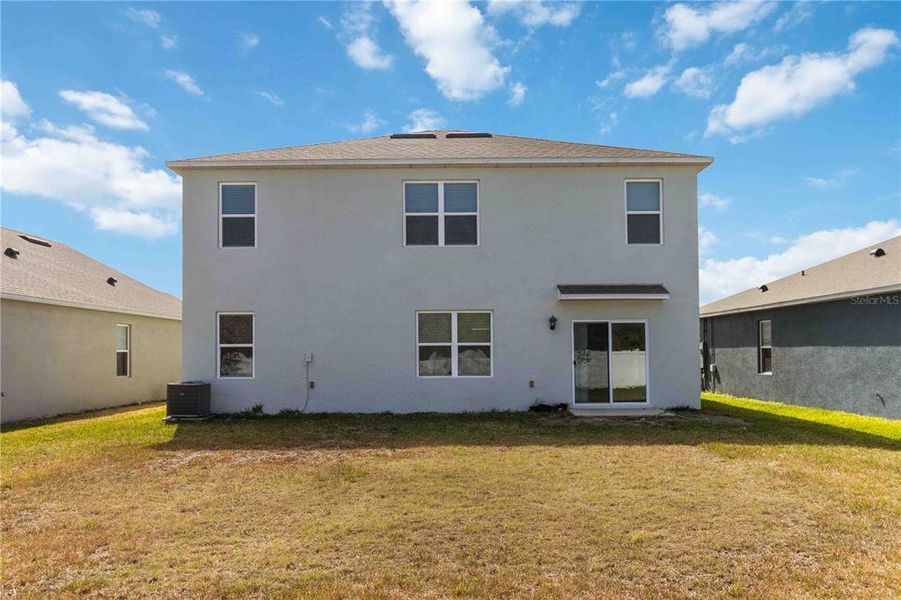 Exterior details and patio area of a home in , New Smyrna Beach (Image 26).