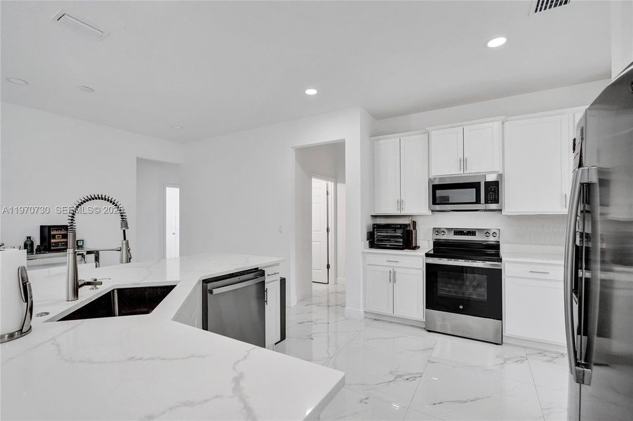 Furnished interior view inside a new home in , Loxahatchee (Image 72).