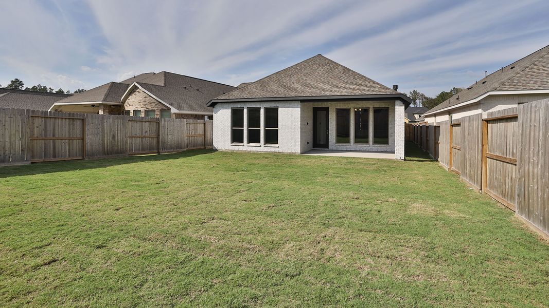 Exterior details and patio area of a home in The Highlands, Porter (Image 3).